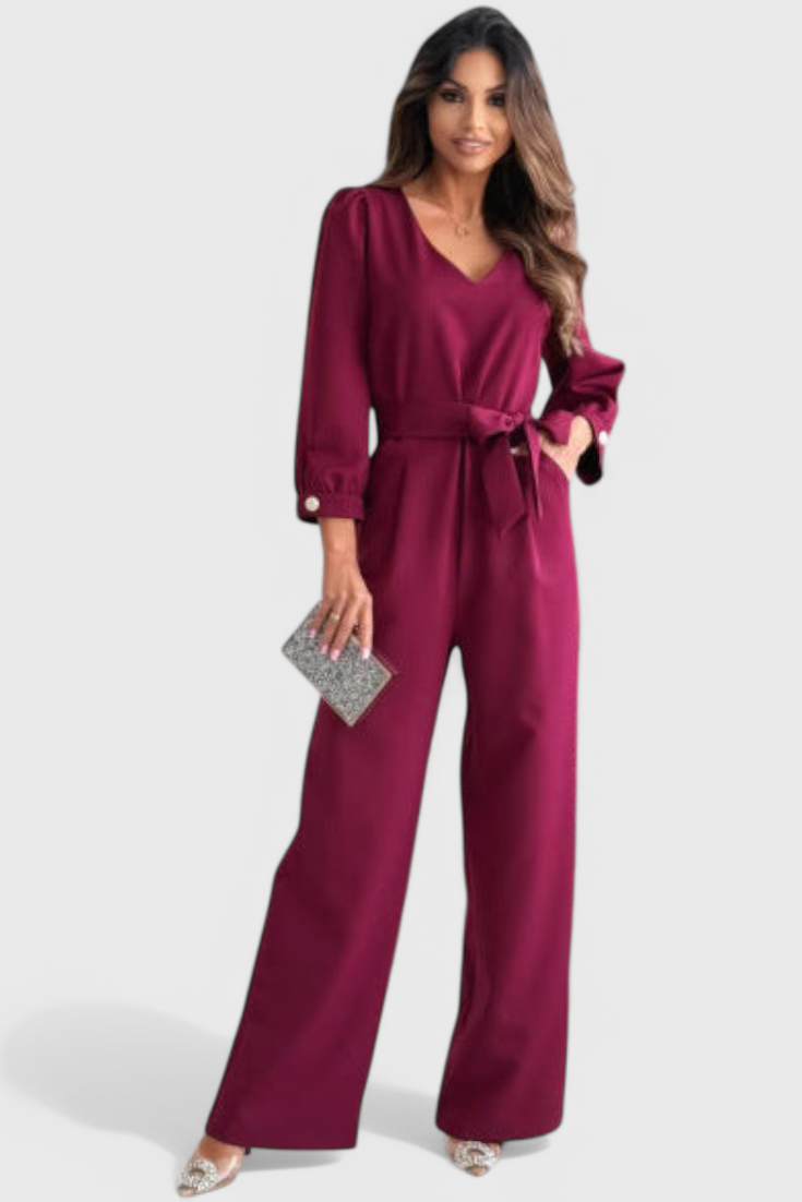 Ariane Mono Luksus Bred Ben Jumpsuit Med V Udskæring Sløjfe